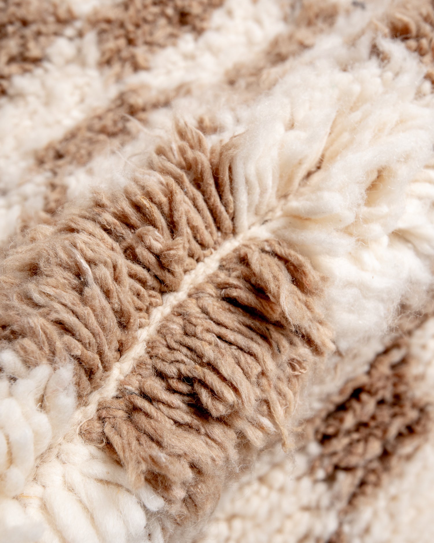 Modern, designer, handcrafted Berber rug from Morocco. Beniourain carpet with beautiful colours and patterns and fluffy wool texture.